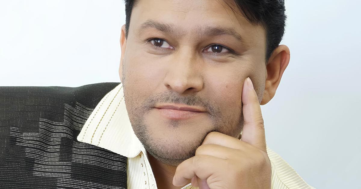 A photo of slain gay Imam Muhsin Hendricks looking pensive